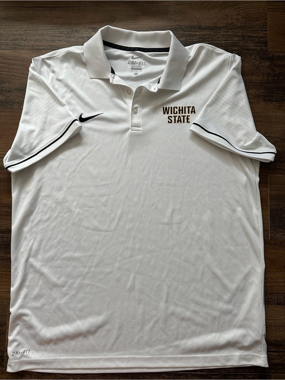 A pair of Nike White Wichita State Dri-FIT Polo with Black Accents